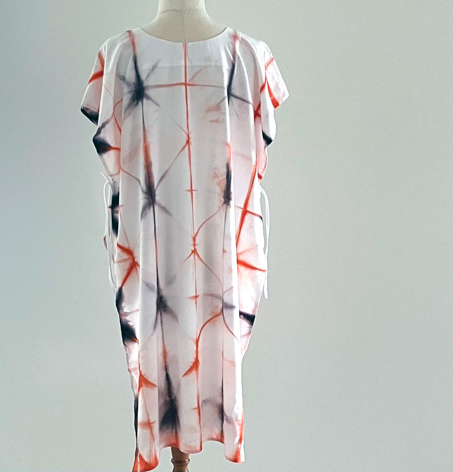 Tangerine 'Criss Cross' Shibori tabard by Neelam Singhal