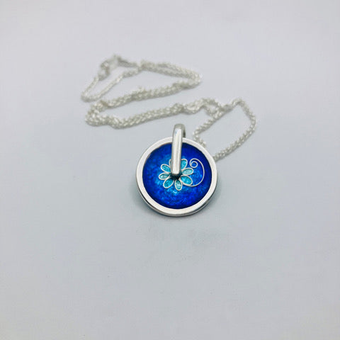 Blue and Turquoise cloisonne enamel spinning pendant handmade by Laura Haszard