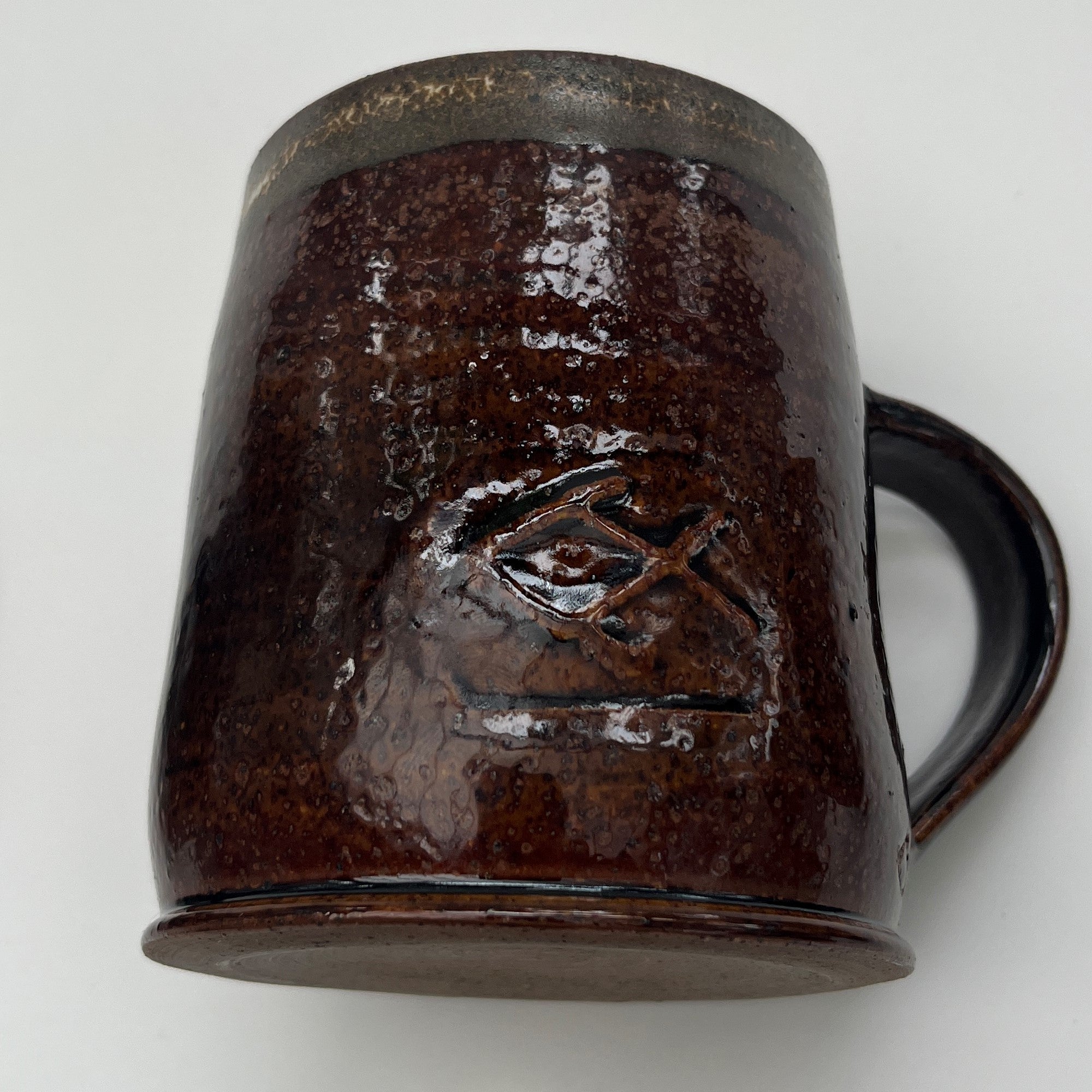Base & side of Ceramic glazed mug handmade by Brett Smout.