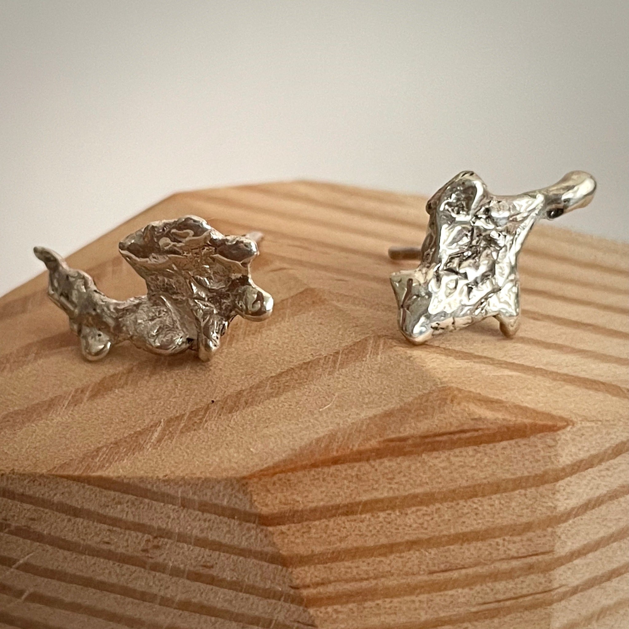 Small water cast stirling silver stud earrings handmade by Pam de Groot