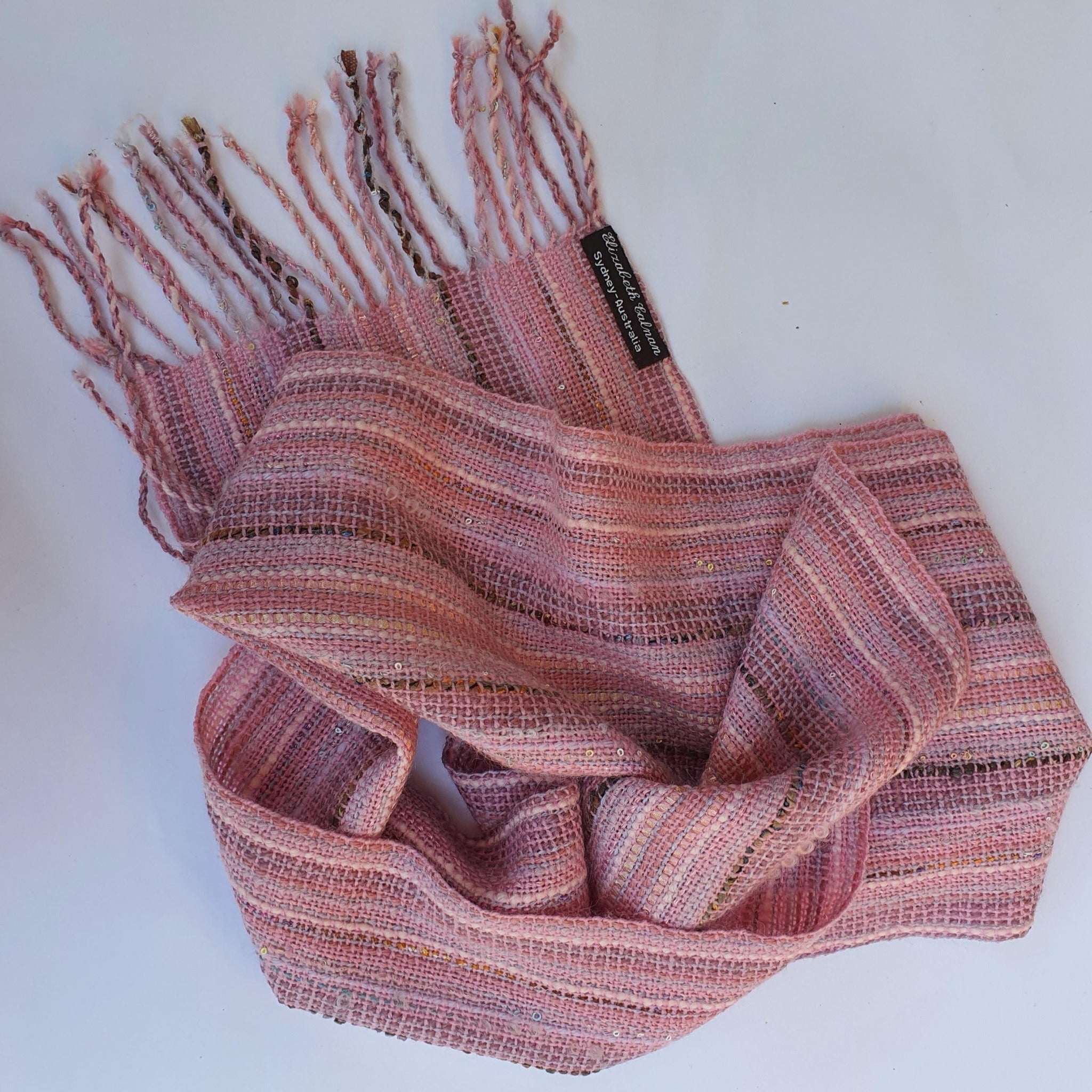 Pale pink wool and accent yarn scarf