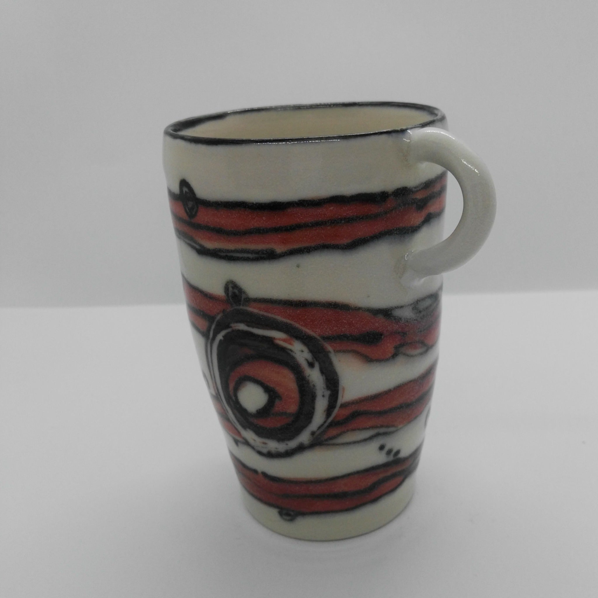 Ceramic mug (red) hand made by Heidi Francis.